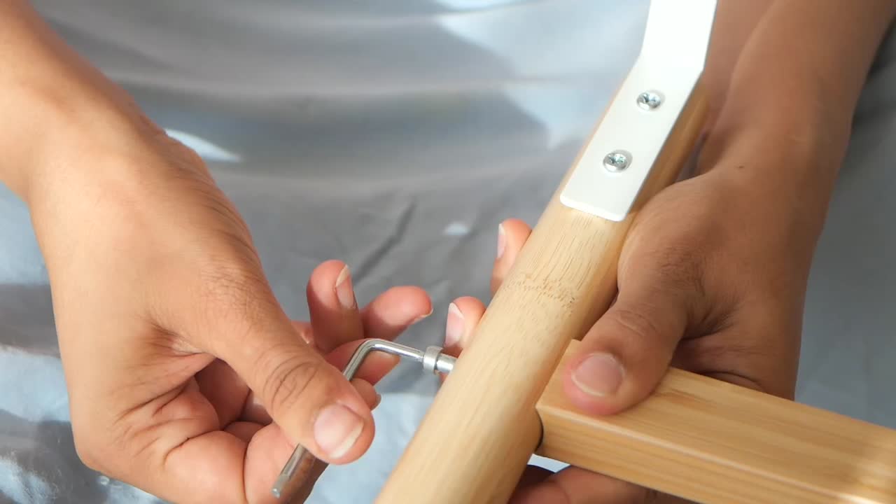 Assembling furniture with an Allen wrench