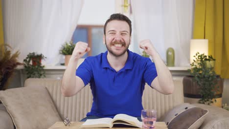 man experiencing joy looking at camera.