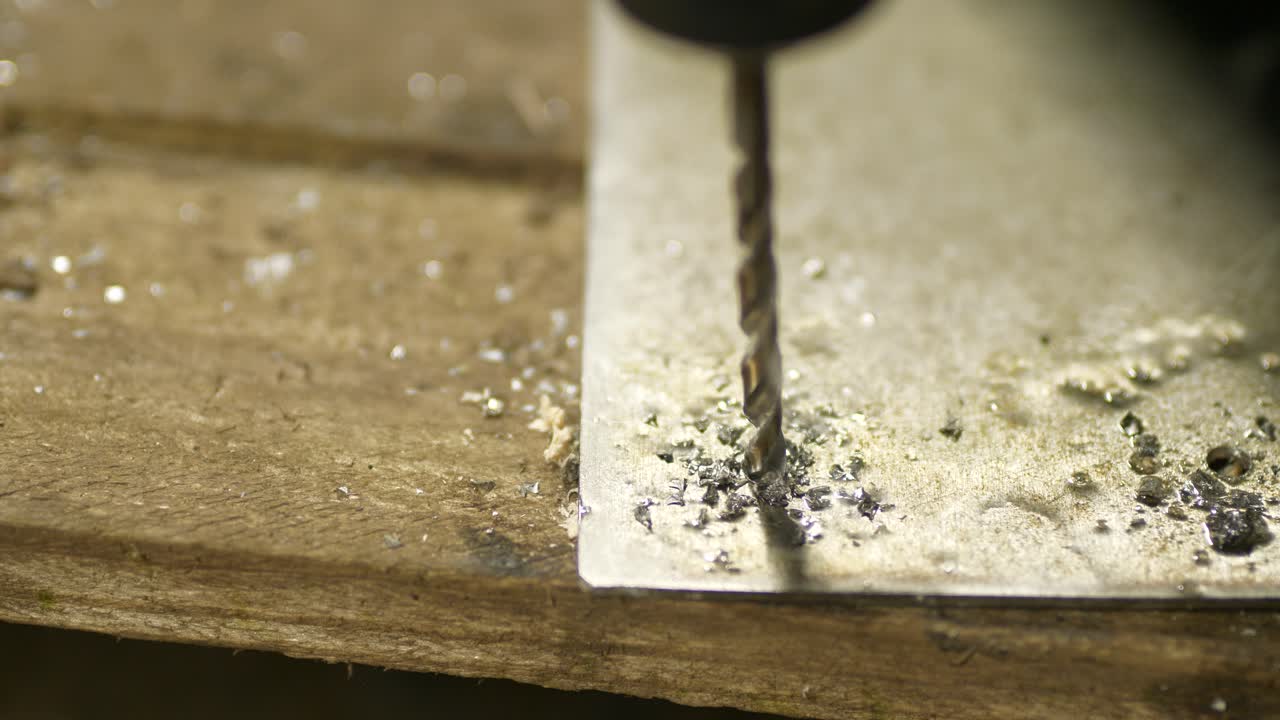 Drilling stainless steel sheet metal close up