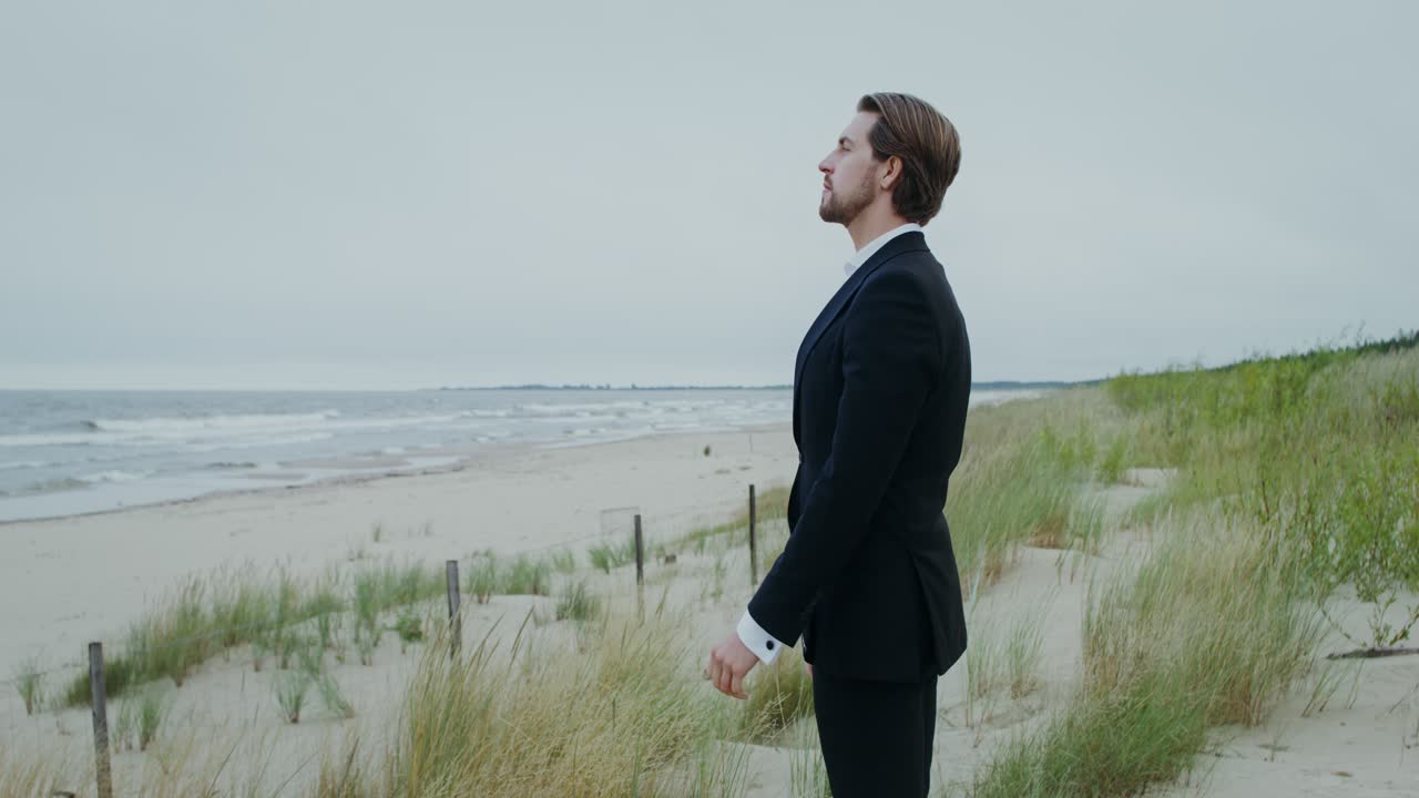 Man in Suit on a Beach