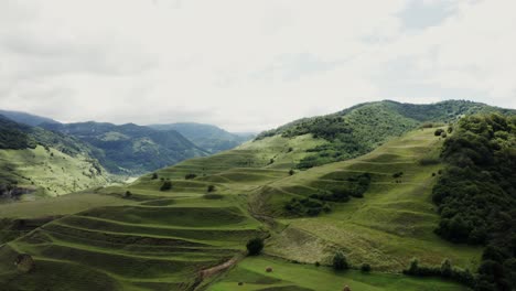 green rolling hills and mountains