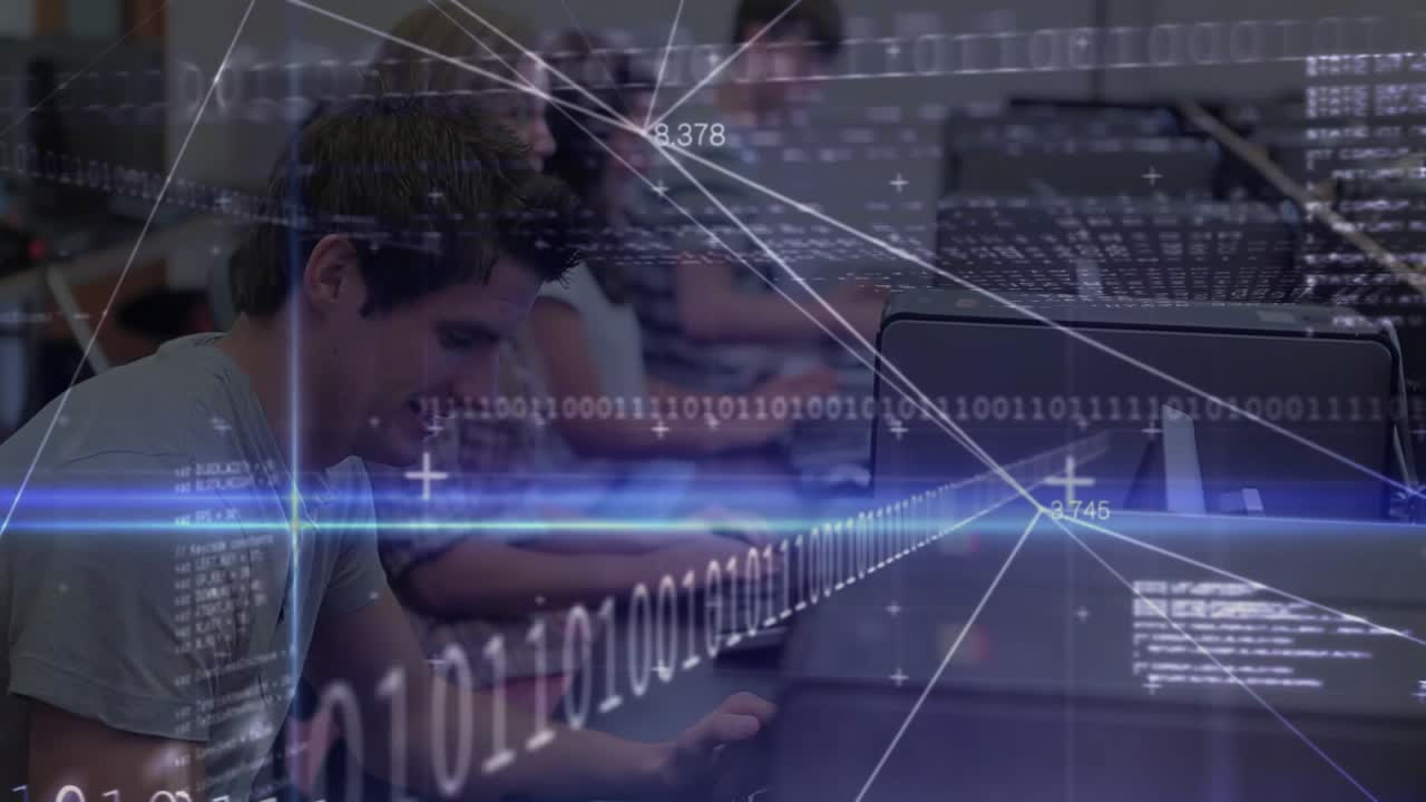 Male student typing in tech lab causing code overlay intensifying then receding before smiling