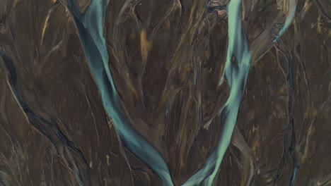 landscape of kálfafell river braids in iceland - aerial top down