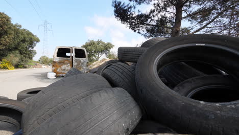 inside of pile of tires view discovering an illegal dump burned car france