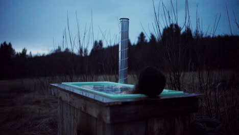 person relaxing on an off-grid wood-fired hot tub