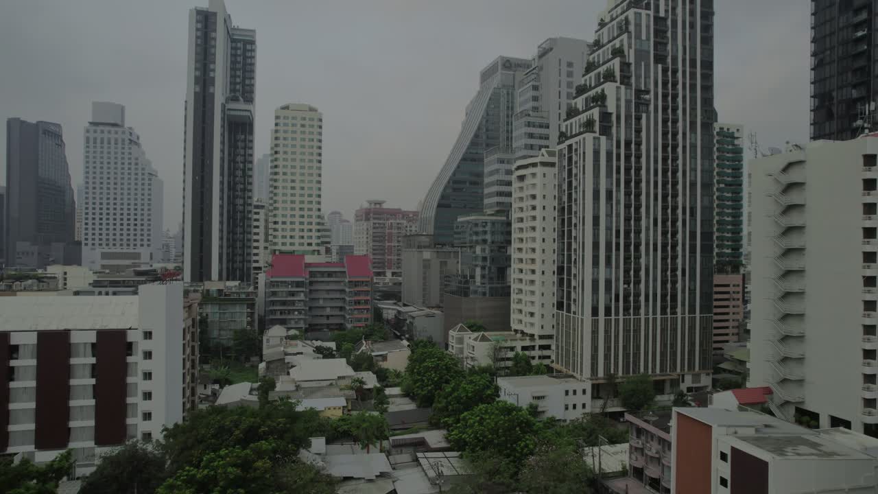 Aerial View of a Dense City with Skyscrapers and Older Buildings