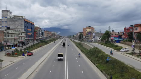 kathmandu, nepal - october 1, 2019: traffic on the roads of kathmandu, nepal and the pollution in the city.