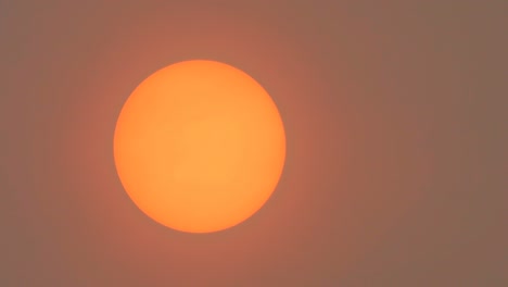 sunlight obscured by sahara dust and wildfire smoke