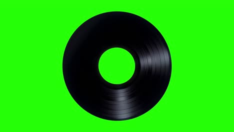 vinyl record is rotating on a green screen. 4k