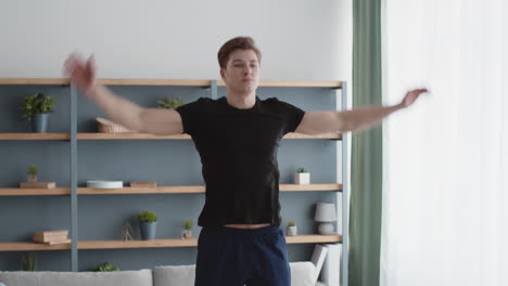 man jumping in living room