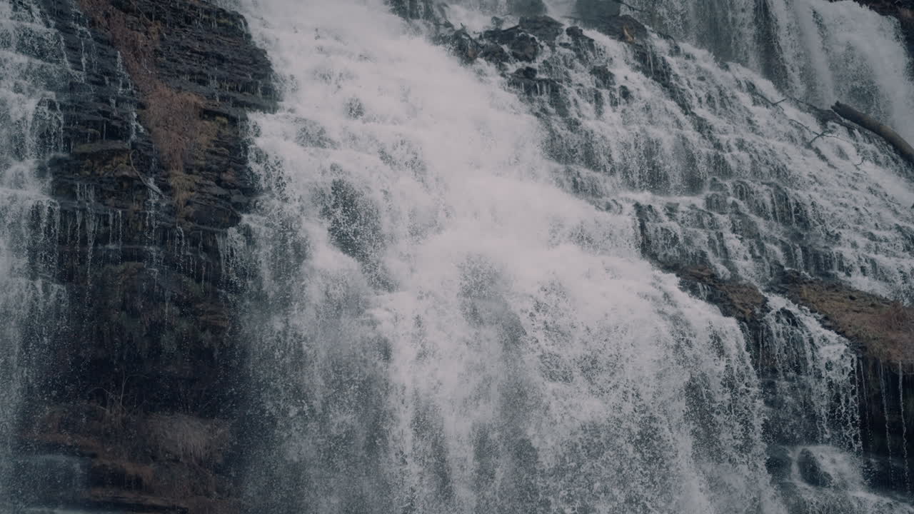 Powerful Waterfall Cascading Down Rocks