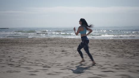 woman running on the beach