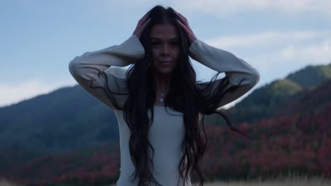 young beautiful woman walking enjoying scenic nature views