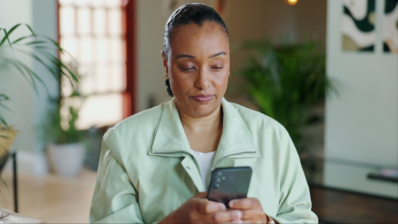 Woman Using Smartphone Indoors
