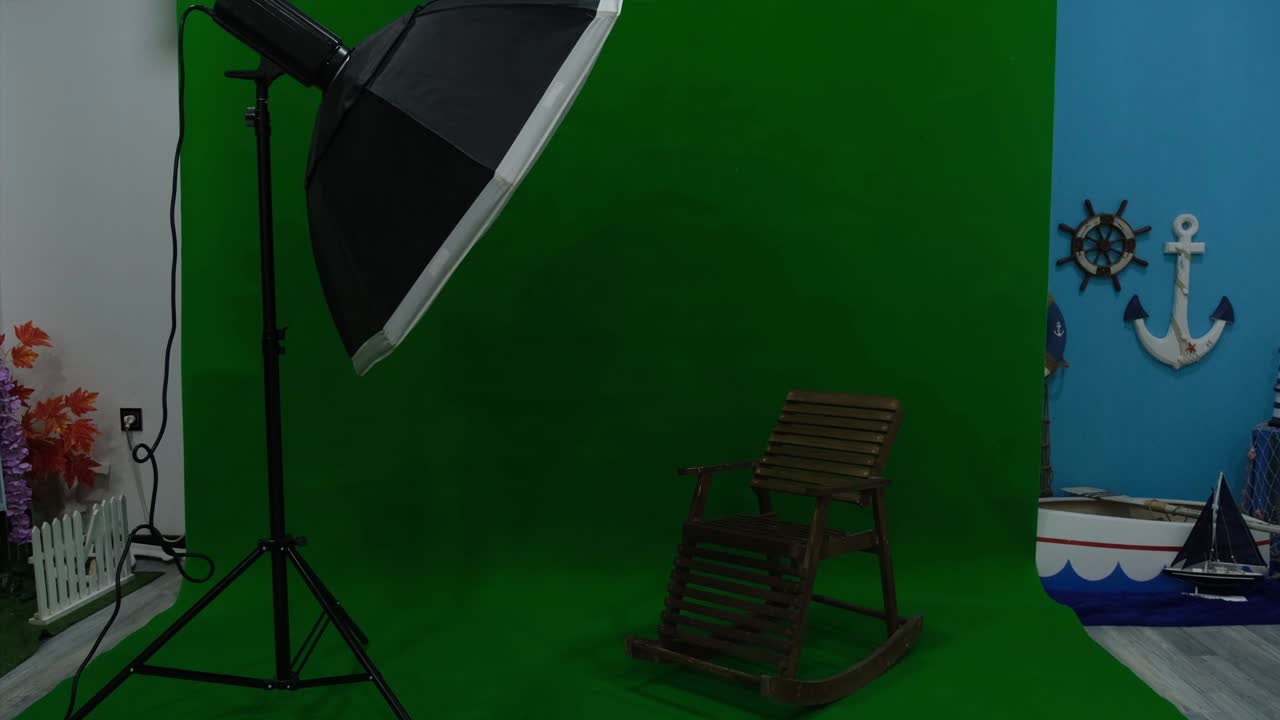 estudio de fotos o video con dos luces de estudio hexagonal. pantalla verde y silla fija