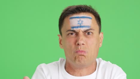 man with israeli national flag upset with a referee