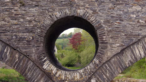 Close up of the man made stone holes in the Cenarth bridge at Cenarth Falls on the river Teifi
