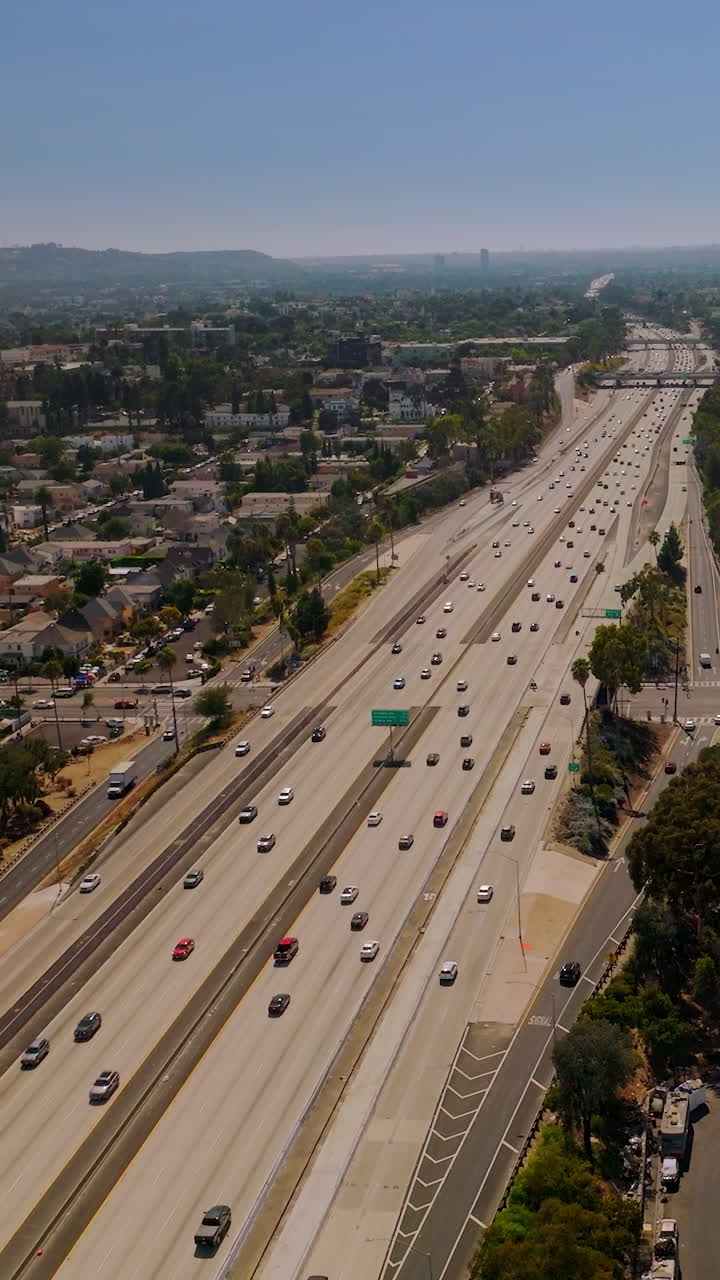 Los-Angeles city buildings aerial view. Drone view of american district. Vertical video