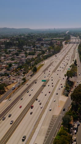 los-angeles city buildings aerial view. drone view of american district. vertical video