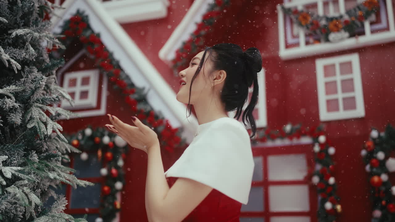 Woman in Red Dress near Christmas Tree