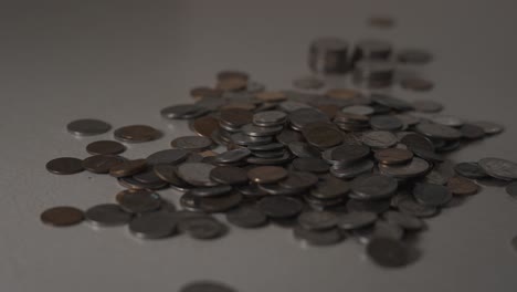 stacking and picking up various coins