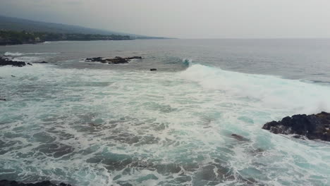 Aerial-of-rocky-Hawaiian-beach