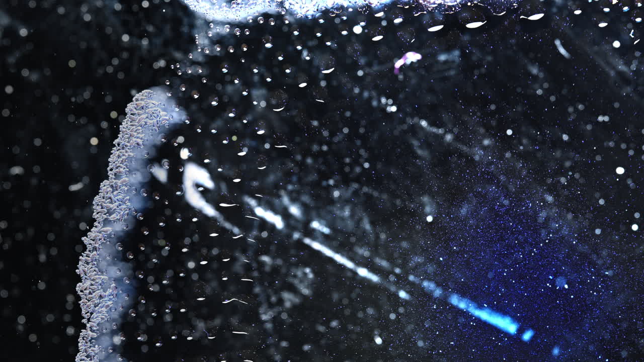 Colorful ink blending in water, creating a stunning abstract view with vibrant details