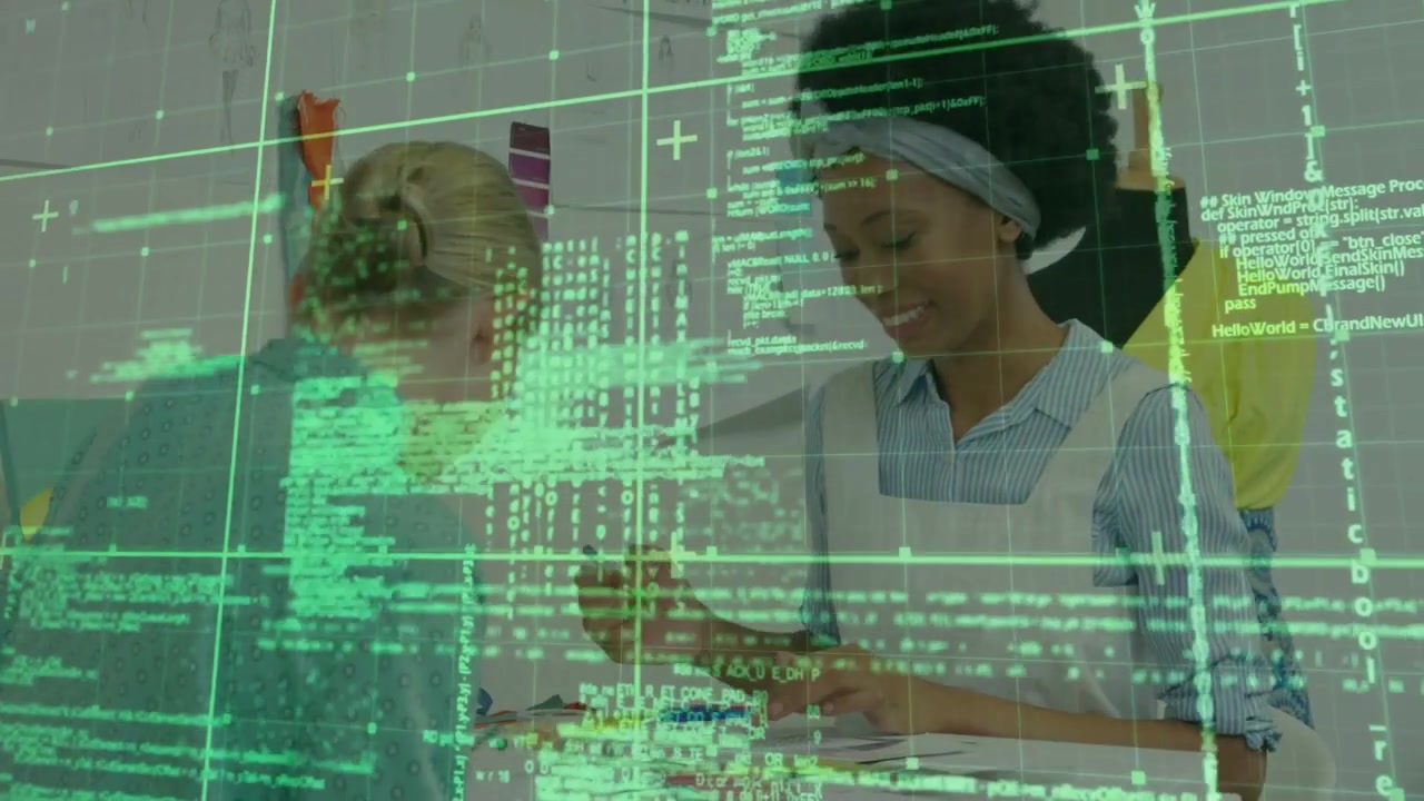 Two women swapping swatches and sketching in design studio green code overlay leading design edits