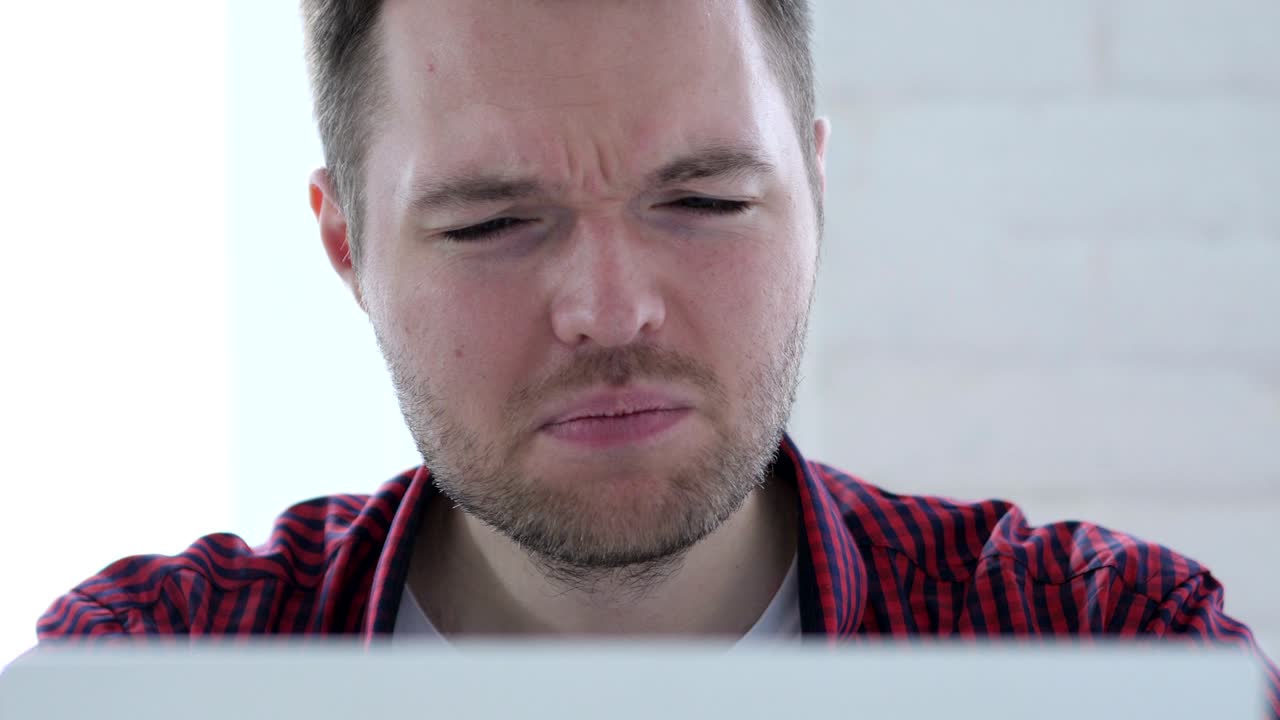 Online Video Chat by Young Man at Work, Close Up