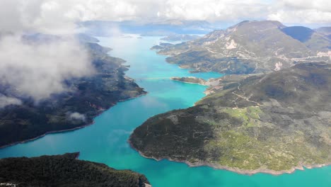 limni kremaston, aerial panoramic footage of kremaston lake evritania greece, cloudy agrafa mountains