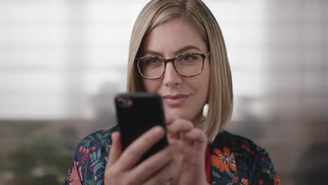 close up portrait of pretty blonde business woman texting browsing using smartphone serious focused female networking communicating online with people