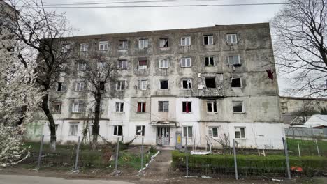 damaged building after big explosion during war in ukraine