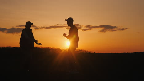 couple dancing at sunset