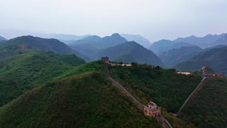 panoramic drone shot circling the great wall, dark, cloudy day in north china