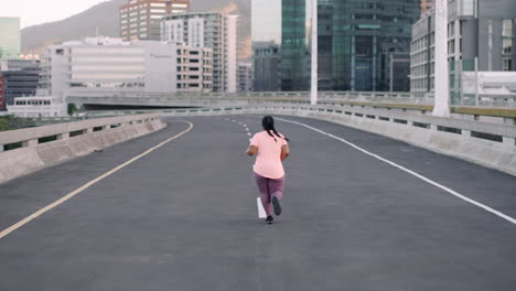 Plus-size-fitness,-woman-or-running-on-city-road