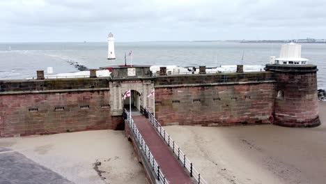 fort perch rock new brighton sandstone coastal defence battery museum aerial view slow push in