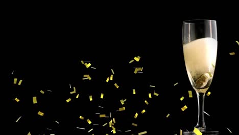 Animation-of-gold-confetti-falling-over-glass-of-champagne