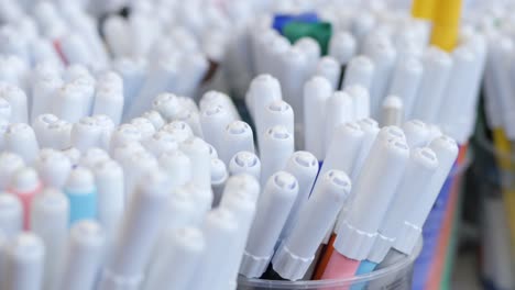 Many-Color-Markers-In-Containers,-RACK-FOCUS