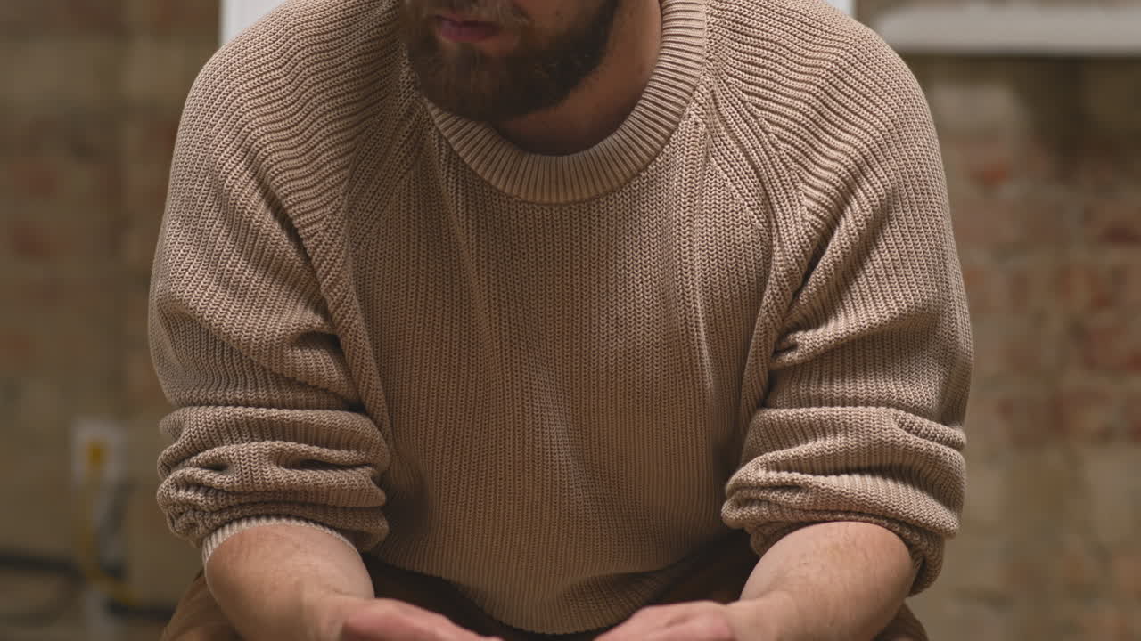 Young Slovenly Man at Group Therapy Session