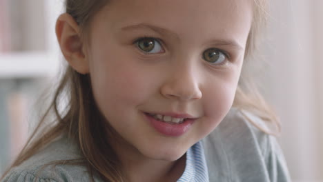 portrait beautiful little girl smiling with natural childhood curiosity looking joyful child with innocent playful expression 4k footage