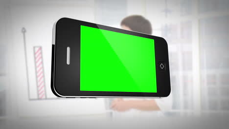 smartphone with green screen in front of business people working