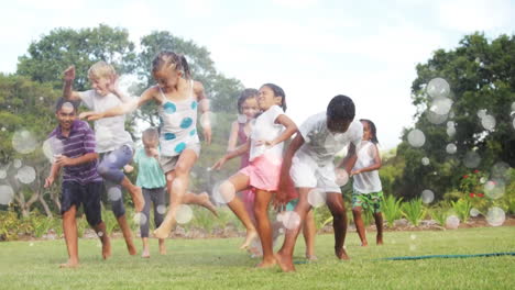 moving spots of white light with children running