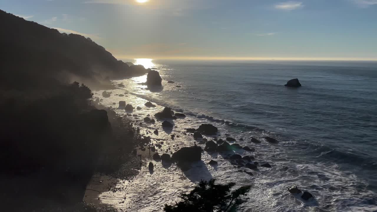 Tilt Shot of People Enjoying the Sunset along the Pacific West Coast at the Lands End Hiking Trail in San Francisco, California