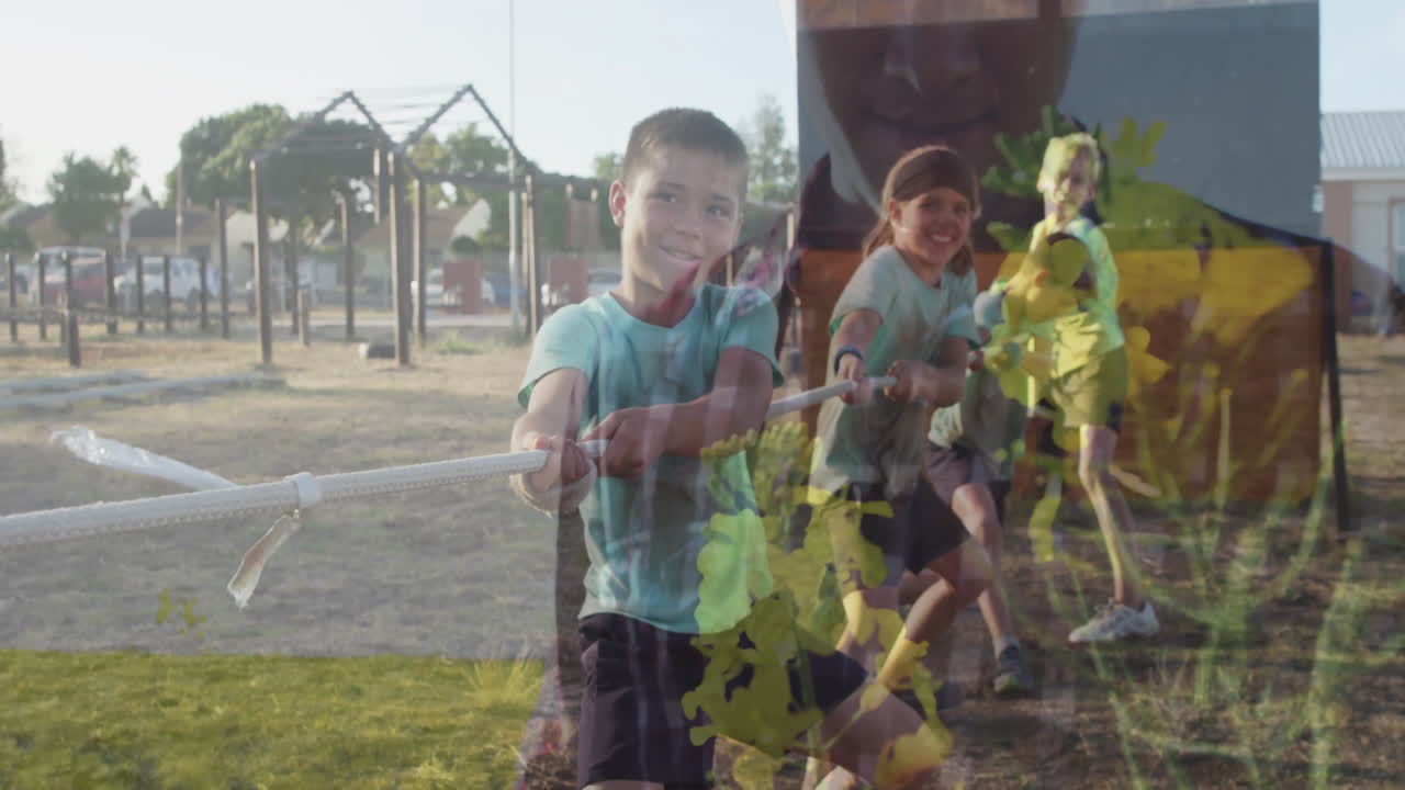 Playing tug-of-war outdoors, children with colorful animation overlay, having fun