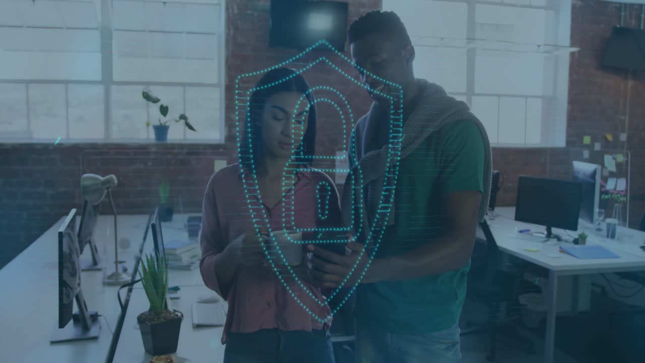 Colleagues reviewing phone content initiating digital shield icon emerging for tech security check