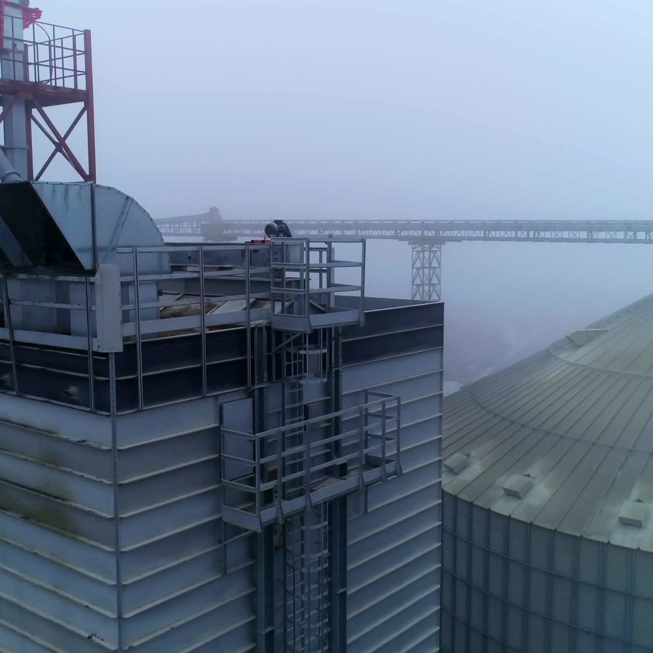 Agricultural huge elevator containers. Big grain elevator containers aerial view