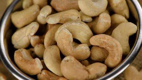 cashew nuts on a rotating plate (seamless loopable)