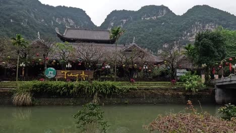 tranquil view of a traditional riverside setting