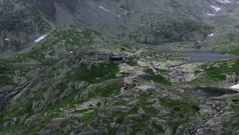 drone shot of mountain cabin teryho chalet open cottage with the highest elevation in high tatras, mala studena dolina cold valleys