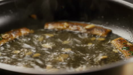 Food Sautéing in a Pan with Garlic